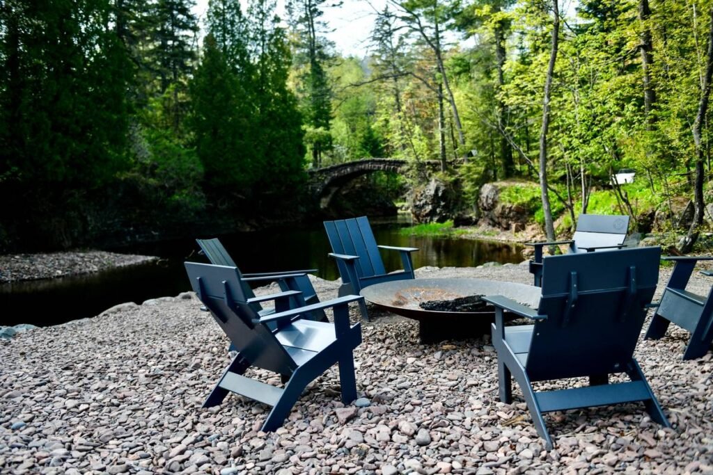 27 Fire Pit Furniture Ideas That Actually Work (No, Your Adirondack Chair Alone Doesn’t Count)