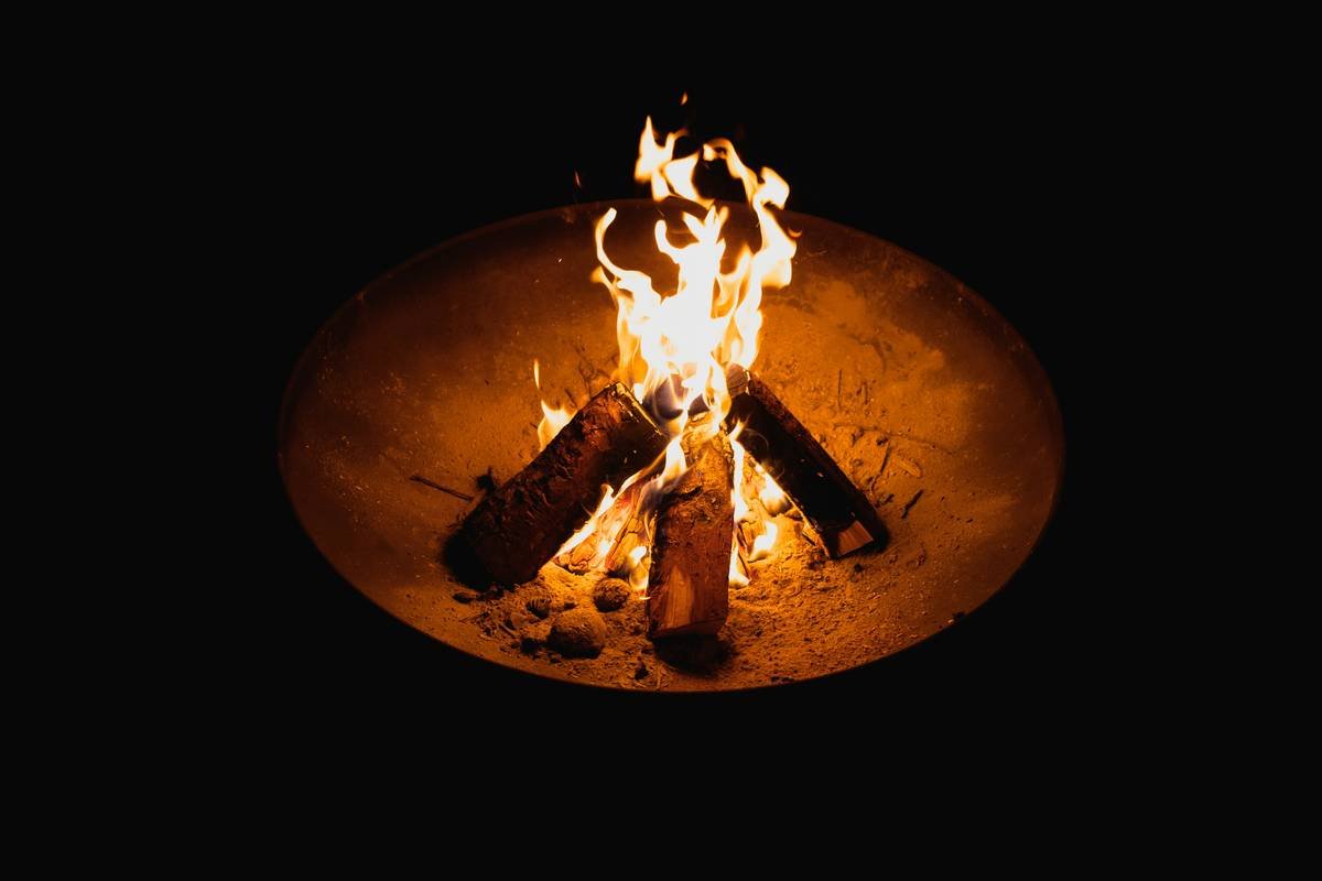 building a fire pit with custom masonry and storage bench